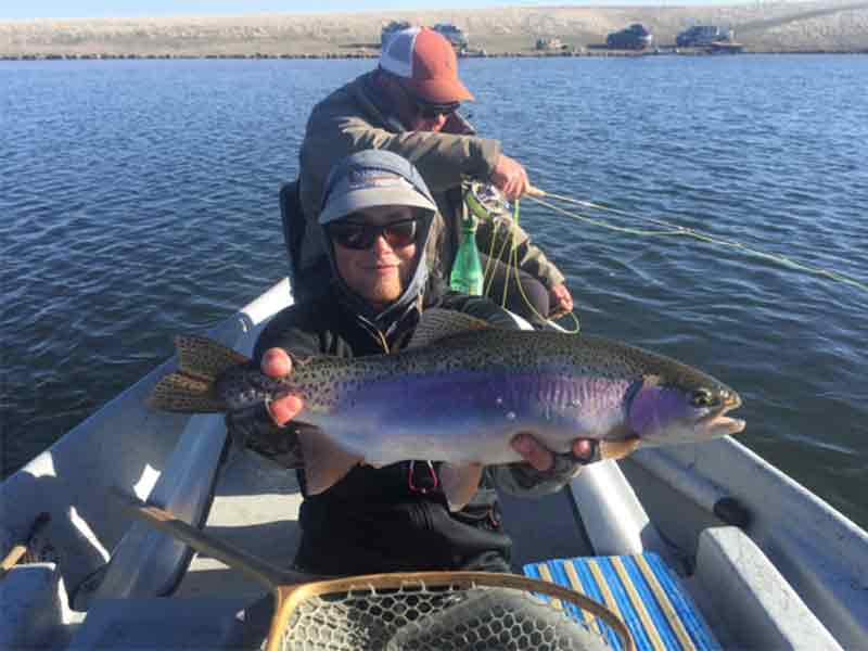 Anglers fish private lakes in Montana with Nelson's Guides and Flies