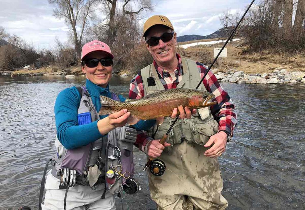 Jacquie Nelson guiding a fly fishing trip in Montana in April.